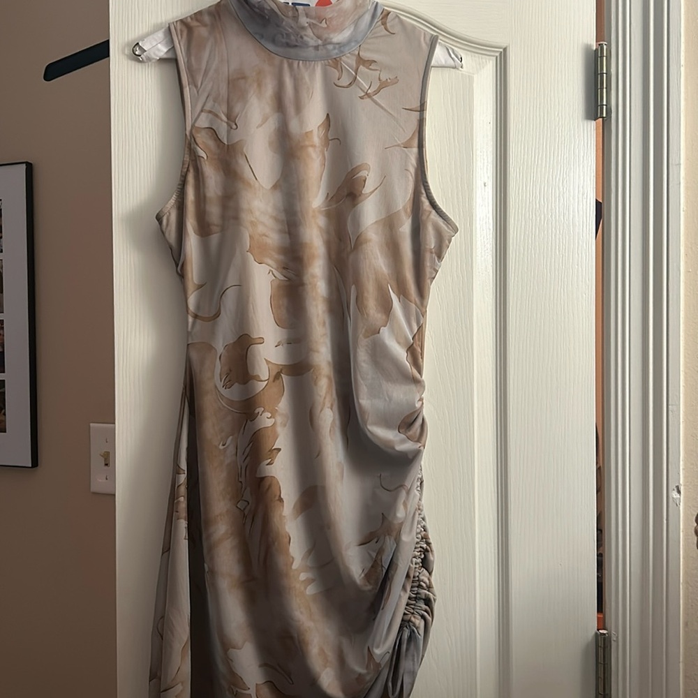 Boutique dress, sleeveless with mock neck. Size large